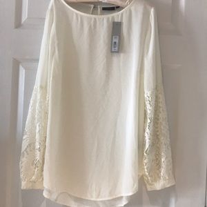 Lace sleeved blouse. Cream colored.